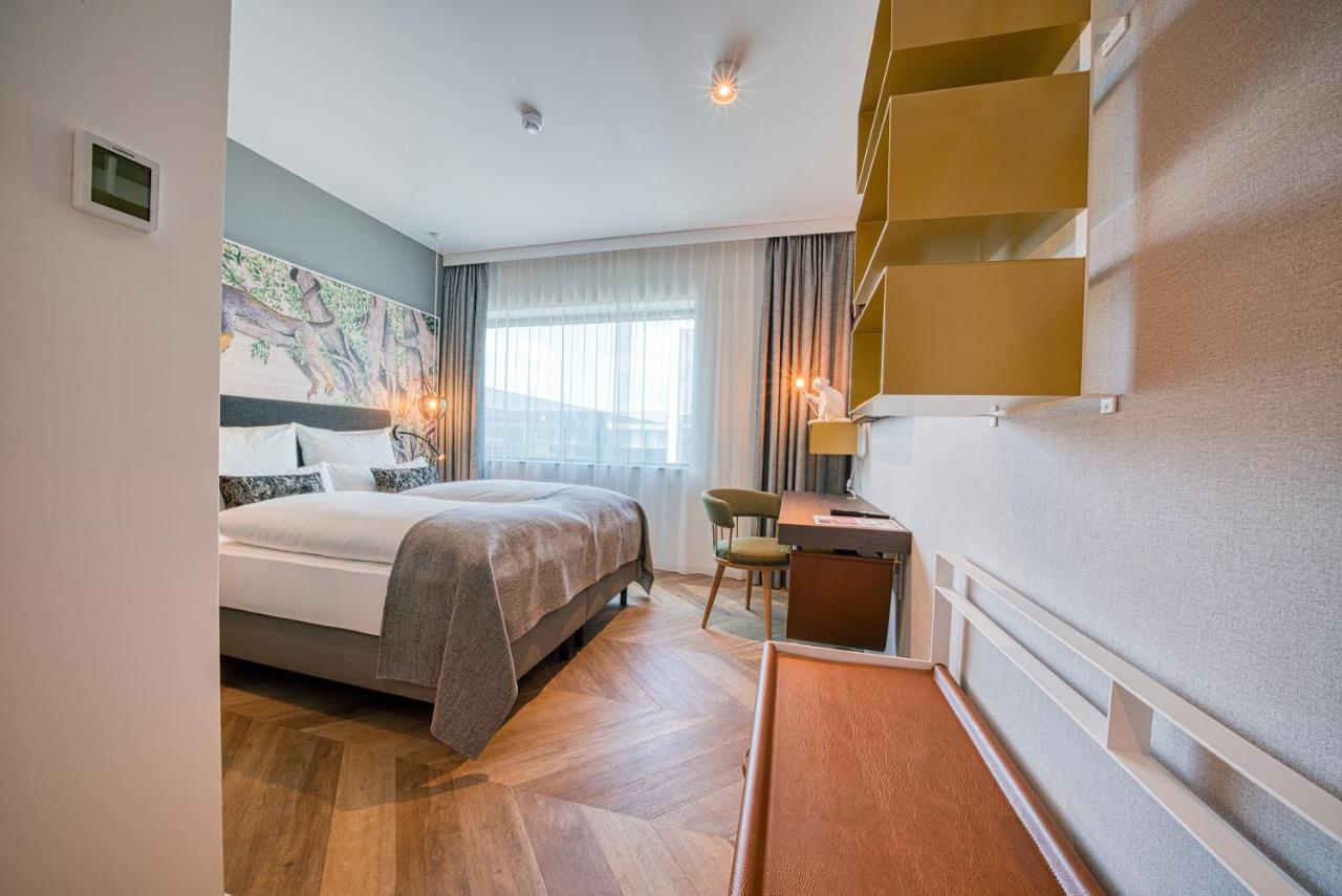 Vienna House Easy By Wyndham Amsterdam Airport Schiphol Hotel โฮฟด์ดอร์ป ภายนอก รูปภาพ